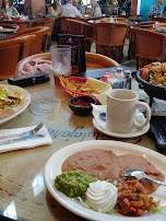 Fajitas Combo Steak Shrimp Chicken with Accompanying Sides and a Beef Taco Combo Plate